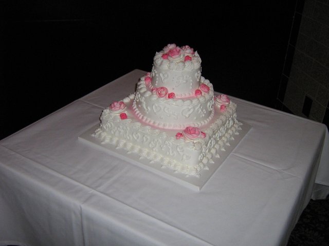 3 Tier15-2 - 3 tiers round and square with pink airbrushed buttercream roses.6&quot;, 9&quot; 12&quot; 14+ pounds, serves 75-90